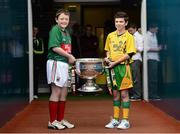 23 September 2012; Mascots Jack Malone, left, Mayo, and Jamie Crawford, Donegal, carry out the Sam Maguire Cup before the start of the game. GAA Football All-Ireland Senior Championship Final, Donegal v Mayo, Croke Park, Dublin. Picture credit: David Maher / SPORTSFILE