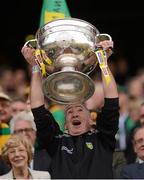 23 September 2012; Donal Reid, Donegal team physiotherapist, lifts the Sam Maguire Cup. GAA Football All-Ireland Senior Championship Final, Donegal v Mayo, Croke Park, Dublin. Picture credit: Stephen McCarthy / SPORTSFILE