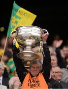23 September 2012; Michael McMenamin, Donegal logistics officer, lifts the Sam Maguire Cup. GAA Football All-Ireland Senior Championship Final, Donegal v Mayo, Croke Park, Dublin. Picture credit: Stephen McCarthy / SPORTSFILE