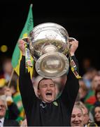 23 September 2012; Joe Mc Closkey, Donegal team kit / equipment officer, lifts the Sam Maguire Cup. GAA Football All-Ireland Senior Championship Final, Donegal v Mayo, Croke Park, Dublin. Picture credit: Stephen McCarthy / SPORTSFILE