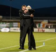 22 September 2012; Robbie Horgan, left, Drogheda United assistant manager, celebrates  with manager Mick Cooke at the end of the game. 2012 EA SPORTS Cup Final, Shamrock Rovers v Drogheda United, Tallaght Stadium, Tallaght, Co. Dublin. Picture credit: David Maher / SPORTSFILE