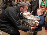 24 September 2012; Donegal manager Jim McGuinness hands the Sam Maguire Cup to Hazel Pakenham, aged 7, from Crumlin, Dublin, during a visit to Our Lady's Hospital for Sick Children, Crumlin, Dublin. Picture credit: Barry Cregg / SPORTSFILE