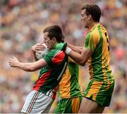 23 September 2012; Cillian O'Connor, Mayo, is tackled by Eamon McGee, Donegal. GAA Football All-Ireland Senior Championship Final, Donegal v Mayo, Croke Park, Dublin. Picture credit: David Maher / SPORTSFILE
