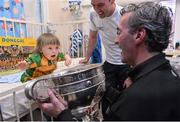 24 September 2012; Donegal manager Jim McGuinness, right, and Karl Lacey show Matthew Murray, age 2, from Letterkenny, Co. Donegal, the Sam Maguire Cup during a visit to Our Lady's Hospital for Sick Children, Crumlin, Dublin. Picture credit: Barry Cregg / SPORTSFILE