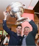 24 September 2012; Donegal's Mark McHugh and his father Martin McHugh, All-Ireland winner in 1992 with Donegal, with the Sam Maguire Cup prior to the squad leaving the Burlington Hotel following their side's victory in their GAA Football All-Ireland Senior Championship Final against Mayo yesterday. Burlington Hotel, Dublin. Picture credit: Pat Murphy / SPORTSFILE