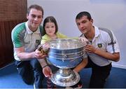 24 September 2012; Donegal players Dermot Molloy, left, and Frank McGlynn with Aoibhín McGlynn, age 6, from Claregalway, Co. Galway, and the Sam Maguire Cup during a visit to Our Lady's Hospital for Sick Children, Crumlin, Dublin. Picture credit: Barry Cregg / SPORTSFILE