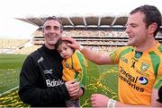 23 September 2012; Donegal manager Jim McGuinness celebrates at the end of the game with his son Jimmy, age 18 months, and team captain Michael Murphy. GAA Football All-Ireland Senior Championship Final, Donegal v Mayo, Croke Park, Dublin. Picture credit: David Maher / SPORTSFILE