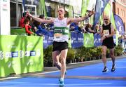29 October 2017; Jimmy Boland of Clonmel AC, Co Tipperary, crosses the finish line during the SSE Airtricity Dublin Marathon 2017 at Merrion Square in Dublin City. 20,000 runners took to the Fitzwilliam Square start line to participate in the 38th running of the SSE Airtricity Dublin Marathon, making it the fifth largest marathon in Europe. Photo by Sam Barnes/Sportsfile