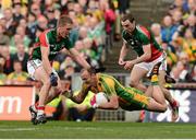 23 September 2012; Colm McFadden, Donegal, in action against Kevin Keane, left`, and Keith Higgins, Mayo. GAA Football All-Ireland Senior Championship Final, Donegal v Mayo, Croke Park, Dublin. Picture credit: David Maher / SPORTSFILE