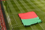 23 September 2012; A large flag in the Mayo colours is brought out into the pitch as part of the pre-match festivities. GAA Football All-Ireland Senior Championship Final, Donegal v Mayo, Croke Park, Dublin. Picture credit: Brendan Moran / SPORTSFILE