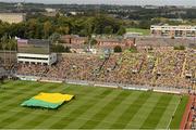 23 September 2012; A large flag in the Mayo colours is brought out into the pitch as part of the pre-match festivities. GAA Football All-Ireland Senior Championship Final, Donegal v Mayo, Croke Park, Dublin. Picture credit: Brendan Moran / SPORTSFILE