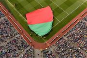 23 September 2012; A large flag in the Mayo colours is brought out into the pitch as part of the pre-match festivities. GAA Football All-Ireland Senior Championship Final, Donegal v Mayo, Croke Park, Dublin. Picture credit: Brendan Moran / SPORTSFILE