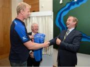 26 September 2012; Leinster captain Leo Cullen presents An Taoiseach Enda Kenny T.D, right, with a Leinster jersey as Minister of State for Tourism & Sport Michael Ring T.D, looks on, during the the official opening of the new offices of Leinster Rugby at UCD, Belfield, Dublin. Picture credit: Matt Browne / SPORTSFILE