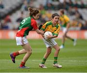23 September 2012; Maria Rafferty, St Patricks PS, Glen, Co. Derry, representing Donegal, in action against Louise Colgan, St Patricks NS, Rathrilly, Co. Carlow, representing Mayo, during the INTO/RESPECT Exhibition GoGames at the GAA Football All-Ireland Senior Championship Final between Donegal and Mayo. Croke Park, Dublin. Picture credit: Oliver McVeigh / SPORTSFILE