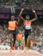 3 September 2012; Samwel Mushai Kimani, Kenya, and his guide James Boit, celebrate winning the Men's 1500m - T11 in a World record time of 3:58.37. London 2012 Paralympic Games, Athletics, Olympic Stadium, Olympic Park, Stratford, London, England. Picture credit: Brian Lawless / SPORTSFILE
