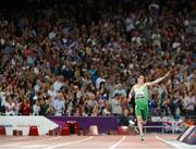 3 September 2012; Ireland's Michael McKillop, from Newtownabbey, Co. Antrim, right, acknowleges the supporters on his way to winning the men's 1500m - T37 final in a time of 4.08:11. London 2012 Paralympic Games, Athletics, Olympic Stadium, Olympic Park, Stratford, London, England. Picture credit: Brian Lawless / SPORTSFILE