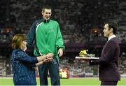 3 September 2012; Ireland's Michael McKillop, from Newtownabbey, Co. Antrim, celebrates as his mother Catherine makes her way to present him with his gold medal after he won the men's 1500m - T37 final in a time of 4.08:11. London 2012 Paralympic Games, Athletics, Olympic Stadium, Olympic Park, Stratford, London, England. Picture credit: Brian Lawless / SPORTSFILE