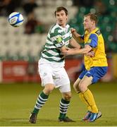 28 September 2012; Craig Sives, Shamrock Rovers, in action against Mark O'Brien, Dundalk. Airtricity League Premier Division, Shamrock Rovers v Dundalk, Tallaght Stadium, Tallaght, Co. Dublin. Picture credit: David Maher / SPORTSFILE
