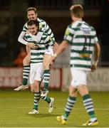 28 September 2012; Ciaran Kilduff, left, Shamrock Rovers, celebrates after scoirng his side's third goal with team-mate Gary Twigg, top. Airtricity League Premier Division, Shamrock Rovers v Dundalk, Tallaght Stadium, Tallaght, Co. Dublin. Picture credit: David Maher / SPORTSFILE