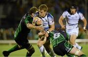 28 September 2012; Ian Madigan, Leinster, is tackled by Michael Swift, left, and Eoin McKeon, Connacht. Celtic League 2012/13, Round 5, Connacht v Leinster, Sportsground, Galway. Picture credit: Matt Browne / SPORTSFILE