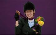 4 September 2012; Ireland's Helen Kearney, from Dunlaven, Co. Wicklow, celebrates after winning a bronze medal in the dressage individual freestyle test - Grade Ia. London 2012 Paralympic Games, Equestrian, Greenwich Park, Greenwich, London, England. Picture credit: Brian Lawless / SPORTSFILE