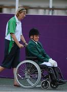 4 September 2012; Ireland's Eilish Byrne, from Dundalk, Co. Louth, with Dara Kearney on her way to collect her bronze medal in the equestrian team championship. London 2012 Paralympic Games, Equestrian, Greenwich Park, Greenwich, London, England. Picture credit: Brian Lawless / SPORTSFILE