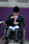 4 September 2012; Geraldine Savage, from Dublin celebrates with her bronze medal in the equestrian team championship. London 2012 Paralympic Games, Equestrian, Greenwich Park, Greenwich, London, England. Picture credit: Brian Lawless / SPORTSFILE