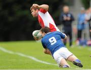 29 September 2012; Martin McPhail, UL Bohemians, is tackled by Matthew D'arcy, St Mary's College. Ulster Bank League Division 1A, St Mary's College v UL Bohemian, Templeville Road, Dublin. Picture credit: Pat Murphy / SPORTSFILE