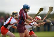 29 September 2012; Orla Curtin, Galway, in action against Aoife Ni Chaiside and Sinead Cassidy, Derry. All-Ireland Intermediate Camogie Championship Final Replay, in association with RTÉ Sport, Derry v Galway, Donaghmore Ashbourne GFC, Ashbourne, Co. Meath. Picture credit: Matt Browne / SPORTSFILE