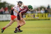 29 September 2012; Deirdre Burke, Galway, in action against Aideen Mullan, Derry. All-Ireland Intermediate Camogie Championship Final Replay, in association with RTÉ Sport, Derry v Galway, Donaghmore Ashbourne GFC, Ashbourne, Co. Meath. Picture credit: Matt Browne / SPORTSFILE