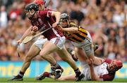 30 September 2012; Galway's Kevin Hynes, supported by team-mates Fergal Moore, hidden, and James Skehill, bottom right, in action against Walter Walsh, Kilkenny. GAA Hurling All-Ireland Senior Championship Final Replay, Kilkenny v Galway, Croke Park, Dublin. Picture credit: Pat Murphy / SPORTSFILE