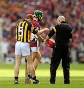 30 September 2012; Tommy Walsh, Kilkenny, changes his helmet during the first half of the game. GAA Hurling All-Ireland Senior Championship Final Replay, Kilkenny v Galway, Croke Park, Dublin. Picture credit: David Maher / SPORTSFILE
