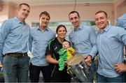 1 October 2012; Aoife O'Hare with her son Donncha, aged 11 weeks, from Moville, Co. Donegal, along with Kilkenny players from left, Henry Shefflin, Aidan Fogarty, Eoin Larkin and Richie Hogan and the Liam MacCarthy Cup during a visit to Our Lady's Hospital for Sick Children, Crumlin, Dublin. Picture credit: Barry Cregg / SPORTSFILE
