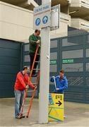 30 September 2012; Staff hang signposts indicating the location of the Family Funzone early on the morning of the game. GAA Hurling All-Ireland Senior Championship Final Replay, Kilkenny v Galway, Croke Park, Dublin. Picture credit: Brendan Moran / SPORTSFILE