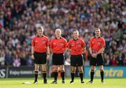 30 September 2012; Match officials, from left, linesmen Barry Kelly and John Sexton, referee James McGrath and sideline official James Owens during the National Anthem. GAA Hurling All-Ireland Senior Championship Final Replay, Kilkenny v Galway, Croke Park, Dublin. Picture credit: Stephen McCarthy / SPORTSFILE