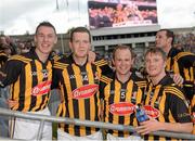 30 September 2012; Kilkenny players, from left, Cillian Buckley, Walter Walsh, Tommy Walsh and Aidan Fogarty await to collect the cup following their victory. GAA Hurling All-Ireland Senior Championship Final Replay, Kilkenny v Galway, Croke Park, Dublin. Picture credit: Ray McManus / SPORTSFILE
