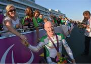 5 September 2012; Ireland's Mark Rohan, from Ballinahown, Co. Westmeath, celebrates with his sister Sarah after receiving his gold medal for victory in the men's individual H 1 time trial. London 2012 Paralympic Games, Cycling, Brands Hatch, Kent, England. Picture credit: Brian Lawless / SPORTSFILE