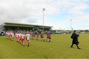 29 September 2012; The Derry players line up with Galway during the parade. All-Ireland Intermediate Camogie Championship Final Replay, in association with RTÉ Sport, Derry v Galway, Donaghmore Ashbourne GFC, Ashbourne, Co. Meath. Picture credit: Matt Browne / SPORTSFILE