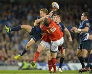6 October 2012; Ian Madigan, Leinster, contests a high ball with Denis Hurley, 15, and Sean Dougall, Munster. Celtic League 2012/13, Round 6, Leinster v Munster, Aviva Stadium, Lansdowne Road, Dublin. Picture credit: Brendan Moran / SPORTSFILE