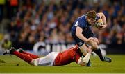 6 October 2012; Brian O'Driscoll, Leinster, is tackled by Peter O'Mahony, Munster. Celtic League 2012/13, Round 6, Leinster v Munster, Aviva Stadium, Lansdowne Road, Dublin. Picture credit: Stephen McCarthy / SPORTSFILE