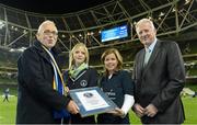 6 October 2012; A Guinness World Record was set of 40,000 'most tossed coins simultaneously' on behalf of Make a Wish, Bank of Ireland, Leinster Rugby and the Aviva Stadium at half-time. Pictured are, from left, Padraic Brennan, Head of Development, Bank of Ireland, Annabel Lawday, Adjudicator, Guinness World Records, Susan O'Dwyer, CEO, Make-a-Wish, and Martin Murphy, Stadium Director, Aviva Stadium. Leinster Rugby / Bank of Ireland / Make-A-Wish Guinness World Record Attempt, Aviva Stadium, Lansdowne Road, Dublin. Picture credit: Brendan Moran / SPORTSFILE