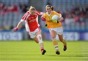 7 October 2012; Clare Timoney, Antrim, in action against Patricia Marmion, Louth. TG4 All-Ireland Ladies Football Junior Championship Final, Antrim v Louth, Croke Park, Dublin. Picture credit: Stephen McCarthy / SPORTSFILE