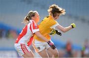 7 October 2012; Kirsty McGuinness, Antrim, in action against Marie O'Connell, Louth. TG4 All-Ireland Ladies Football Junior Championship Final, Antrim v Louth, Croke Park, Dublin. Picture credit: Stephen McCarthy / SPORTSFILE