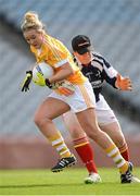 7 October 2012; Anna Finnegan, Antrim, is fouled by Louth goalkeeper Una Pearson which resulted in a penalty. TG4 All-Ireland Ladies Football Junior Championship Final, Antrim v Louth, Croke Park, Dublin. Picture credit: Stephen McCarthy / SPORTSFILE