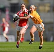 7 October 2012; Michelle McMahon, Louth, is dispossessed by Catherine Mullan, Antrim. TG4 All-Ireland Ladies Football Junior Championship Final, Antrim v Louth, Croke Park, Dublin. Picture credit: Brendan Moran / SPORTSFILE