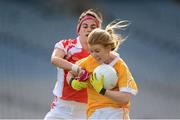 7 October 2012; Mairead Cooper, Antrim, in action against Ann Marie Lynch, Louth. TG4 All-Ireland Ladies Football Junior Championship Final, Antrim v Louth, Croke Park, Dublin. Picture credit: Stephen McCarthy / SPORTSFILE
