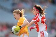 7 October 2012; Mairead Cooper, Antrim, in action against Anne Marie Lynch, Louth. TG4 All-Ireland Ladies Football Junior Championship Final, Antrim v Louth, Croke Park, Dublin. Picture credit: Stephen McCarthy / SPORTSFILE
