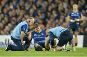 6 October 2012; Leinster's Brian O'Driscoll has his ankle strapped by team physio Garrth Farrell, in the company of team doctor, Dr. Arthur Tanner. Celtic League 2012/13, Round 6, Leinster v Munster, Aviva Stadium, Lansdowne Road, Dublin. Picture credit: Brendan Moran / SPORTSFILE