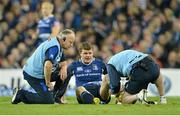 6 October 2012; Leinster's Brian O'Driscoll has his ankle strapped by team physio Garrth Farrell, in the company of team doctor, Dr. Arthur Tanner. Celtic League 2012/13, Round 6, Leinster v Munster, Aviva Stadium, Lansdowne Road, Dublin. Picture credit: Brendan Moran / SPORTSFILE