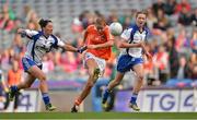 7 October 2012; Shauna O'Hagan, Armagh, in action against Michelle McGrath, left, and Karen McGrath, Waterford. TG4 All-Ireland Ladies Football Intermediate Championship Final, Armagh v Waterford, Croke Park, Dublin. Picture credit: Brendan Moran / SPORTSFILE
